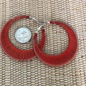 Large red hoop earrings
